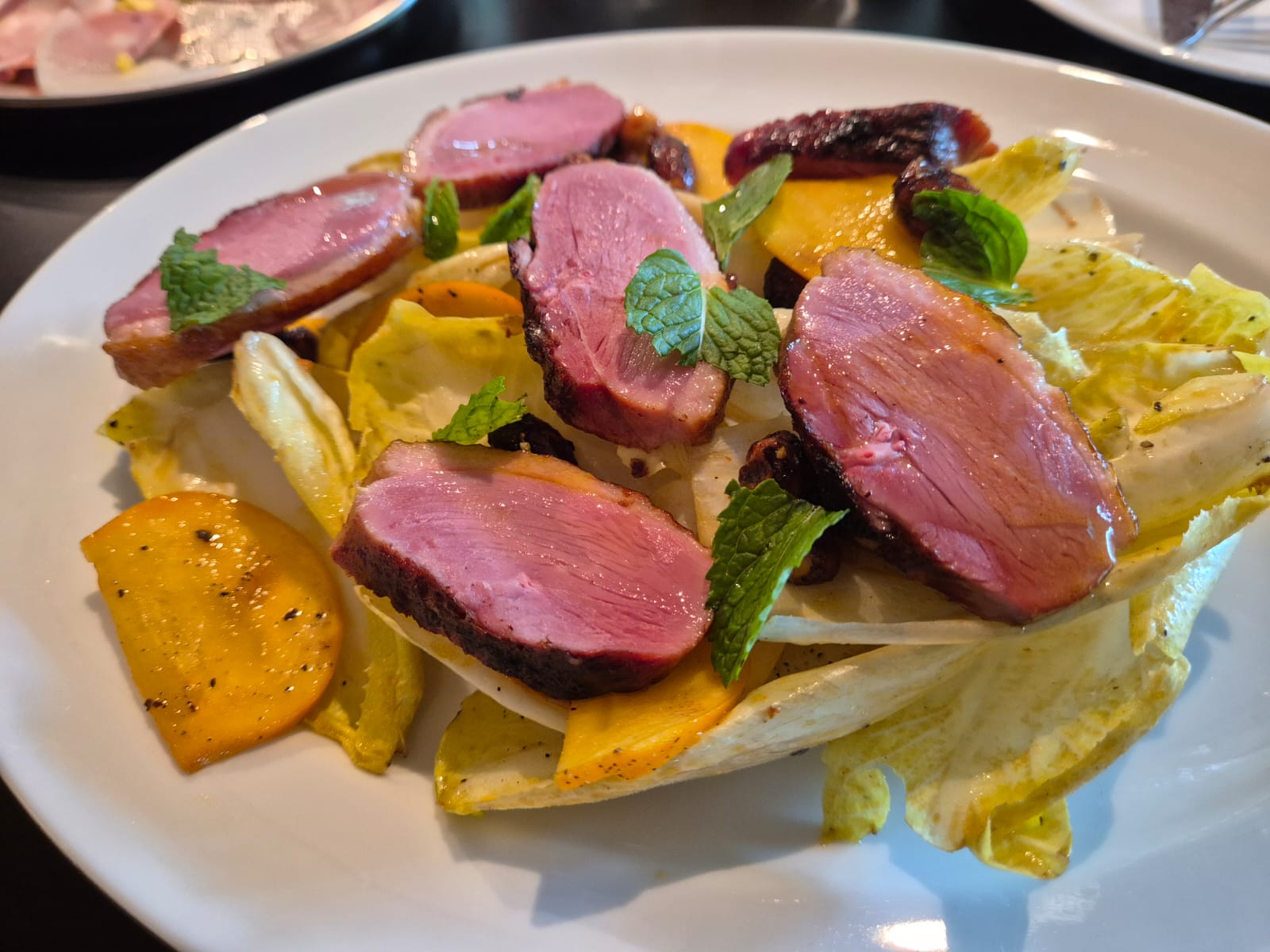Duck breast with endive salad